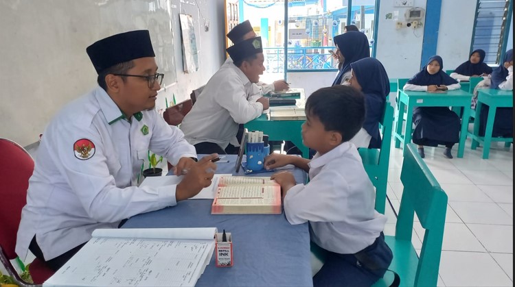 KUA Ujungpangkah dan MTs Muhammadiyah 03 Jalin MoU: Berantas Buta Huruf Al-Qur’an